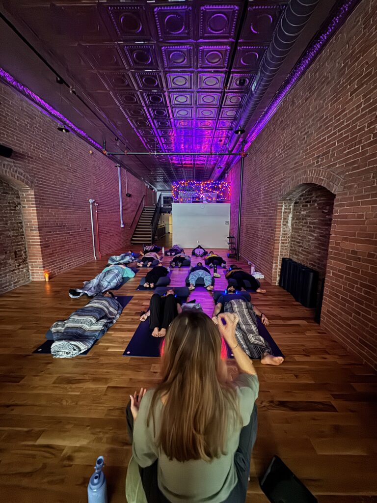 breathwork instructor leading class MindFuel Method Pittsburgh Strip District