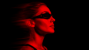 A woman sits in a red light therapy bed at MindFuel Method in the Strip District in Pittsburgh